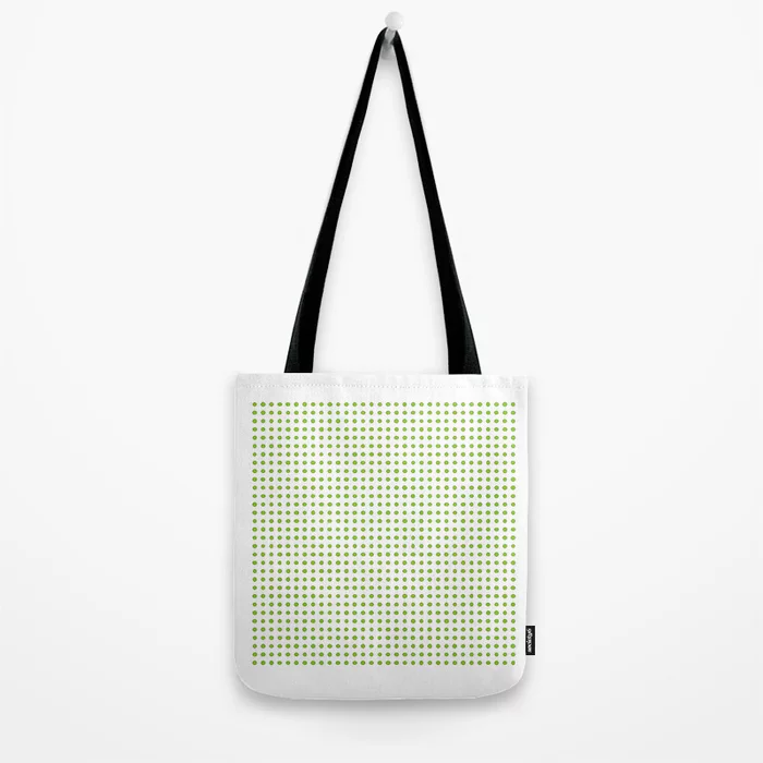 A product photo of a cotton totebag, filled with illustrations of 1024 yellow limes.